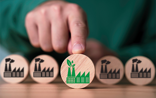 Concept - green factory and reducing carbon emissions © Dilok stock.adobe.com