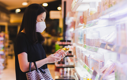 Cosmetics - Asian woman looking a ingredients label © bignai stock.adobe.com