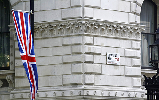 Place - Downing Street and UK flag © pncphotos stock.adobe.com